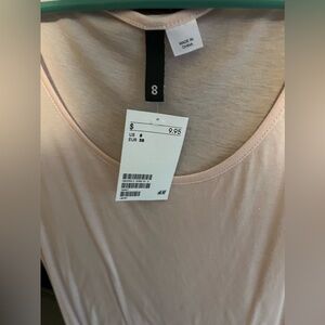 Pink H&am top with ruffled sleeves